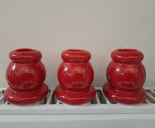 3 red Candle holders