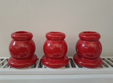 3 red Candle holders