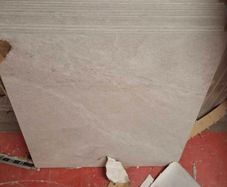 Durstone.  5.76m2 60x60 tiles light grey