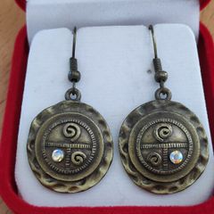 Round antiqued style brass tone metal dangle earrings