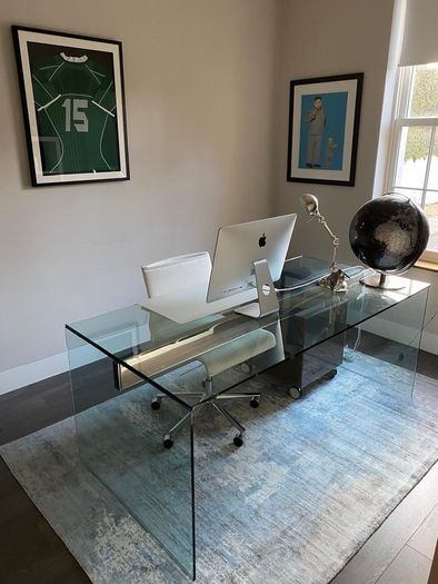 Modern glass desk with integrated drawer unit