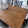 Solid oak dining table and chairs Image 3