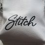 Stitch crossbody bag with matching purse. Image 3