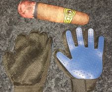 A pair of pet grooming and deshedding glove and Cigar designed toy for dogs