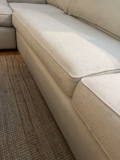 large L shaped cream sofa