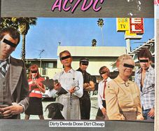 AC/DC Original Irish 1978 release of Dirty Deeds done dirt cheap with original inner lyrics sheet  vinyl in nm condition. Sleeve in vg condition with some sticker damage on front