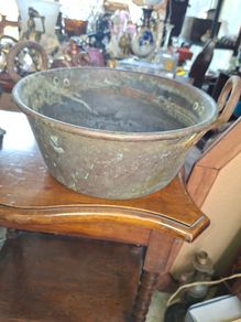 Antique Copper Cauldron, circa 19th to early 20th century. It features prominent riveted iron handles on each side and displays an authentic verdigris patina,. Postage Available