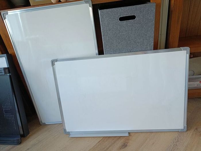 two whiteboards 58 X 90 cm