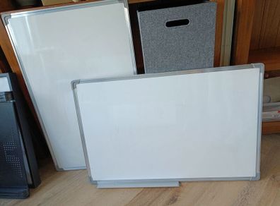two whiteboards 58 X 90 cm