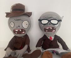 Cowboy and newspaper zombie plushie - plants vs zombies