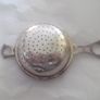 a solid  vintage silver strainer Image 2