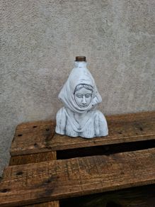 Very unusual whte lady bottle postage possible