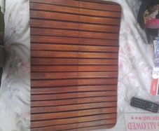 New wooden look bath mat