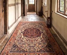 This is a nice medium sized hand knotted carpet.
