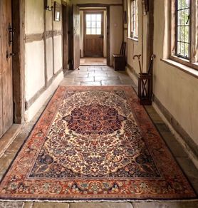 This is a nice medium sized hand knotted carpet.