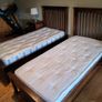 2 single beds with mattresses Image 2
