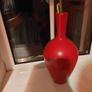Pretty red vase with single artificial flower stem Image 2
