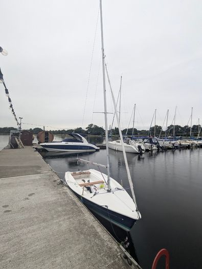 Laser 13 sailboat with road and launching trailer