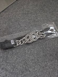 New with tags. 68cm Elasticated belt with Silver Chain & Diamante design to front.