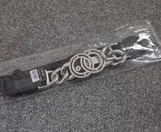 New with tags. 68cm Elasticated belt with Silver Chain & Diamante design to front.
