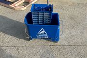 Blue mop bucket