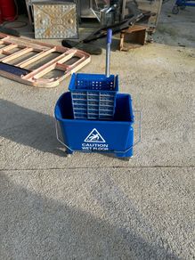 Blue mop bucket
