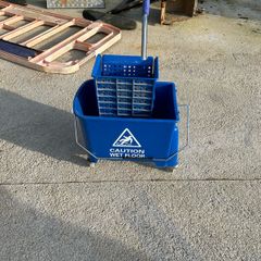 Blue mop bucket