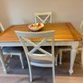 Extendible Wooden dining table & 4 fabric cushioned chairs Image 6
