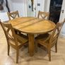 Small round EXTENDABLE dining table & 4 chairs Image 3