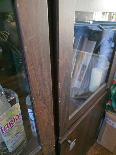 Dark wood glass cabinet