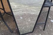 Black heavy metal framed mirror