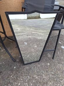 Black heavy metal framed mirror