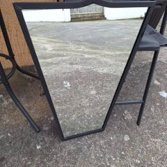 Black heavy metal framed mirror