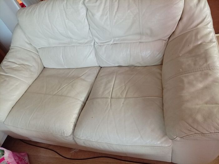 2 cream leather 2 seater sofa s