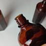 313 - Set of 3 Beautiful Vintage Decorative Collectible Dark Amber Glass Milton Bottles Image 6