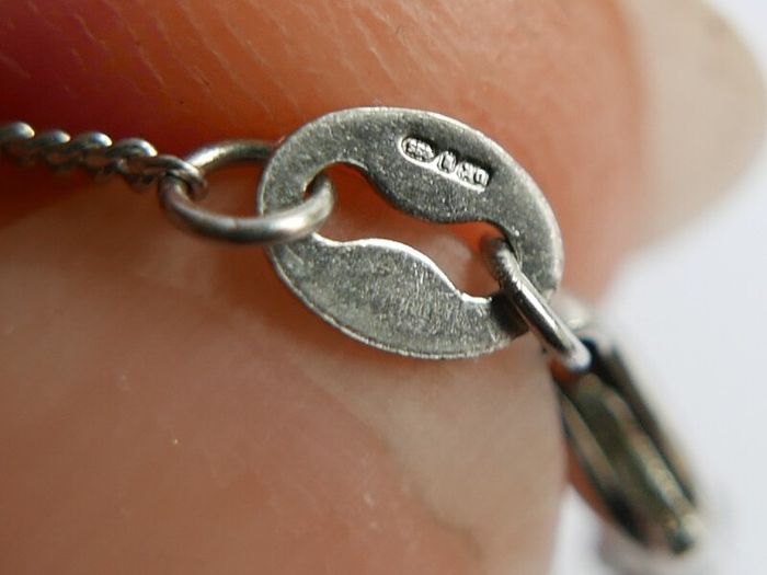 Vintage 925 Sterling Silver necklace with teardrop and round stone pendant