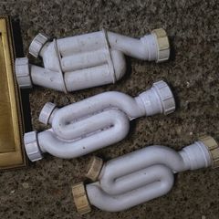 Sink waste traps