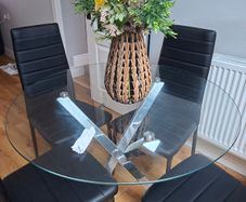 Round glass dining table and chairs