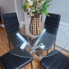 Round glass dining table and chairs