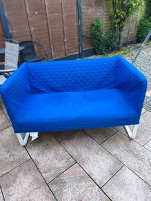 Sofa in good condition; the cover is removable and needs washing.
