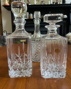 Trio of vintage glass/crystal decanters Price for all three