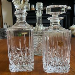 Trio of vintage glass/crystal decanters Price for all three