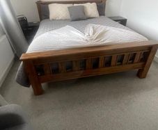 Wood bed frame with mattress