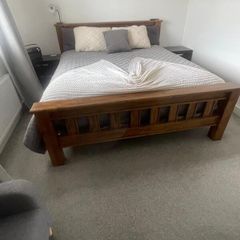 Wood bed frame with mattress