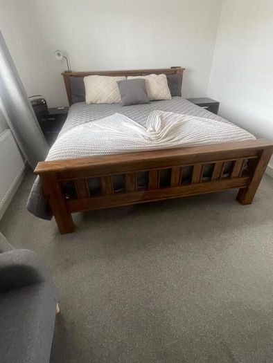Wood bed frame with mattress