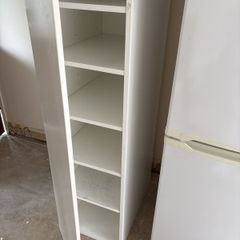 High cabinet with shelves