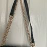 Black quilted flap shoulder bag with gold hardware Image 4
