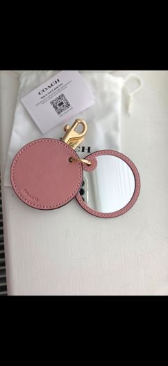 Coach mirror charm