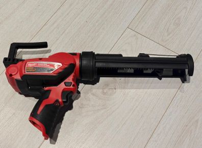 Milwaukee M12 Cordless 10oz Caulk and Adhesive Gun (Model 2441-20) - Used Once, Mint Condition