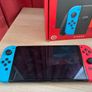 Nintendo Switch OLED (Neon Blue/Red) + Mario Kart 8 Deluxe + Super Mario Bros. W Image 6